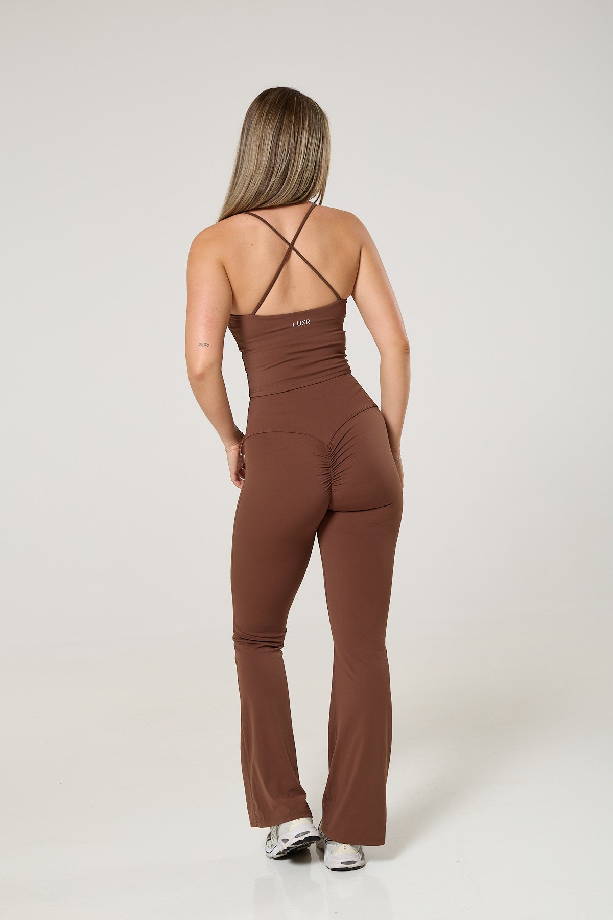 Cross back tank top, long sleeve crop top & flared leggings set