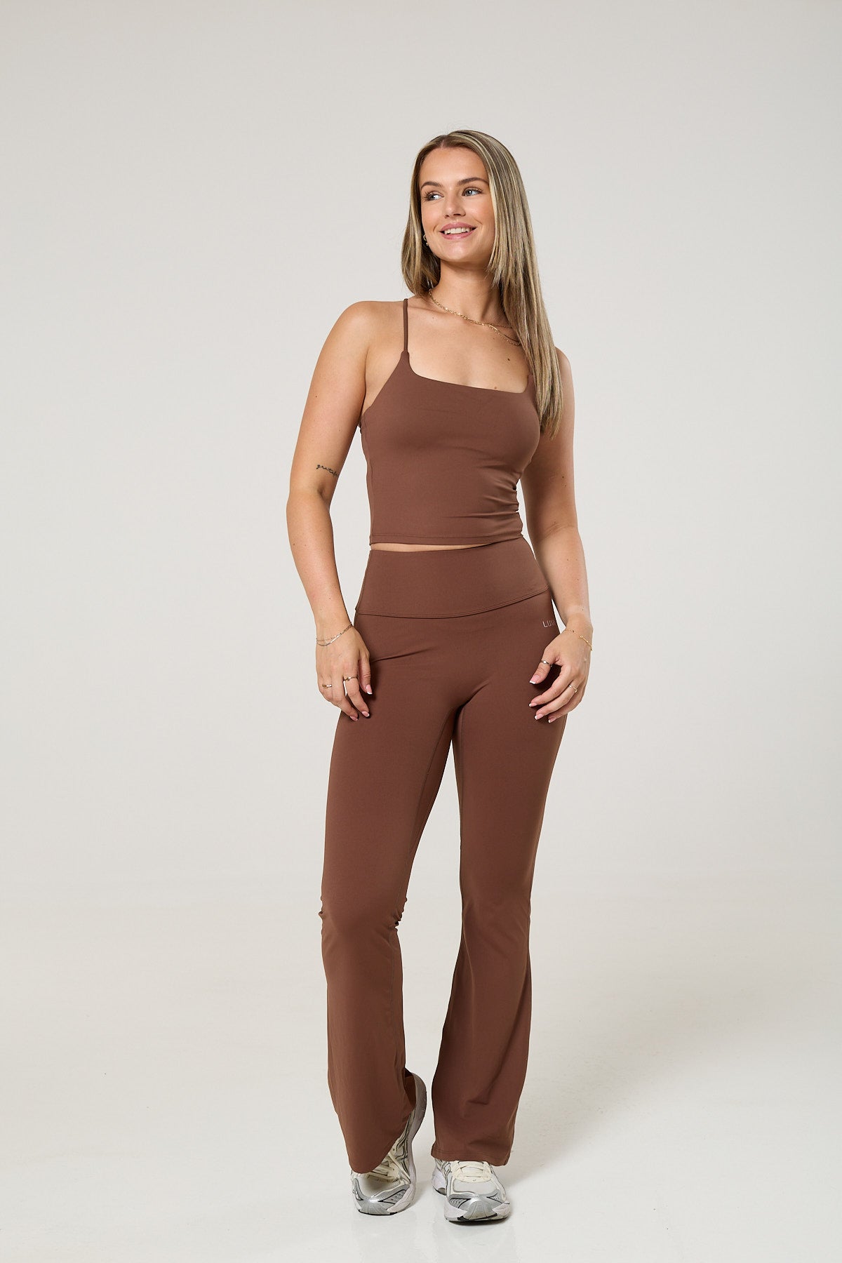 Cross back tank top, long sleeve crop top & flared leggings set