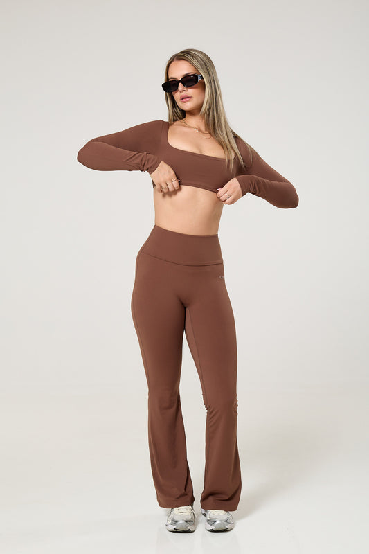 Cross back tank top, long sleeve crop top & flared leggings set