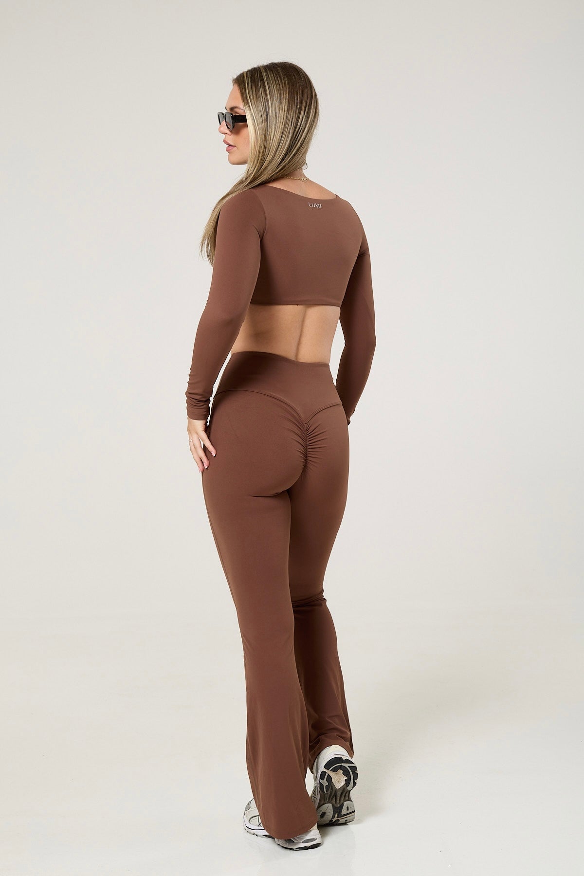Cross back tank top, long sleeve crop top & flared leggings set